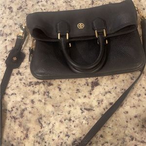 Tory Burch can be used as shoulder bad or crossbody bag. In great condition.